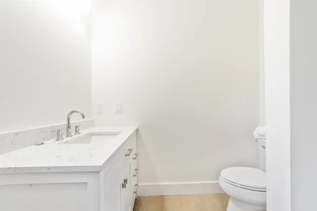 a bathroom with a sink and a toilet