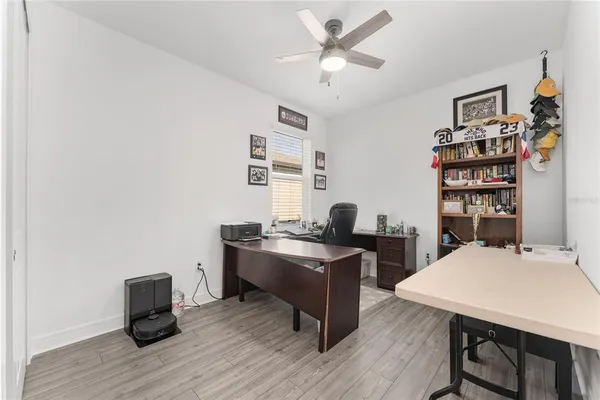 a view of a garage with rack and bicycle