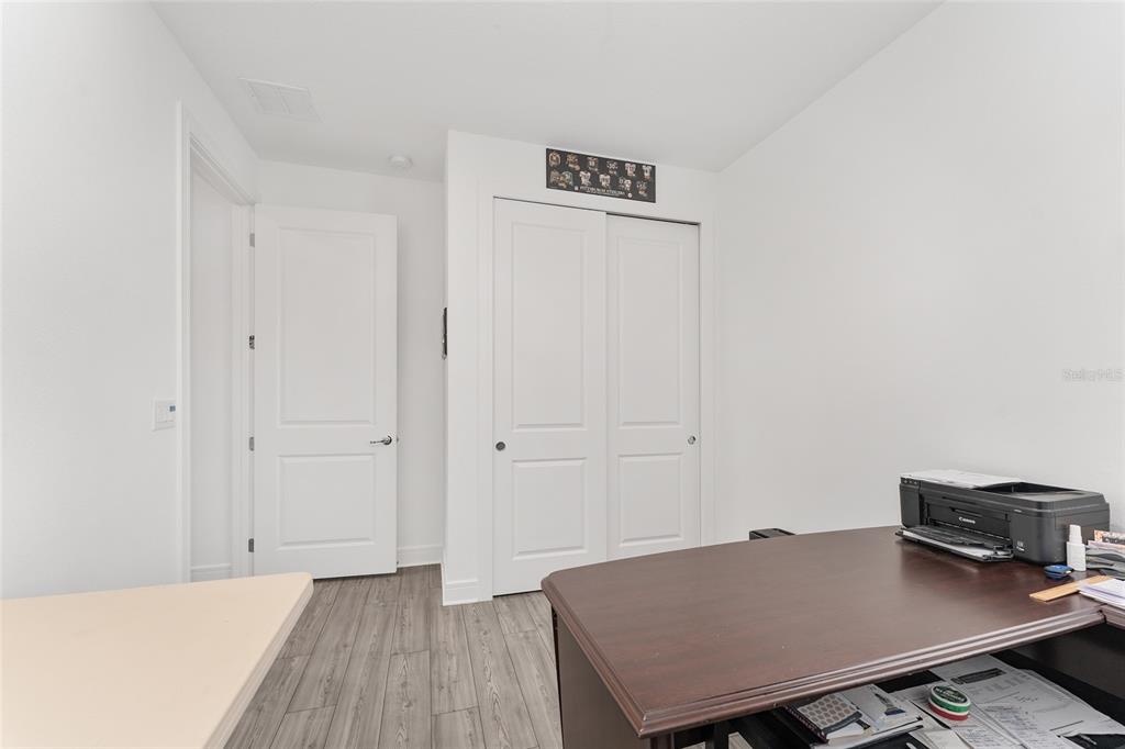 6034 Southwest 86th Circle Ocala, FL 34481 - Photo 32 of 59 a view of a workspace with furniture