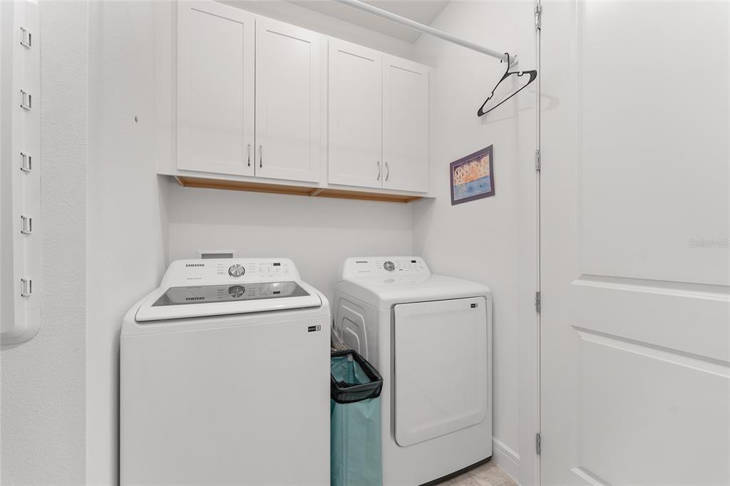 6034 Southwest 86th Circle Ocala, FL 34481 - Photo 35 of 59 a utility room with dryer and washer