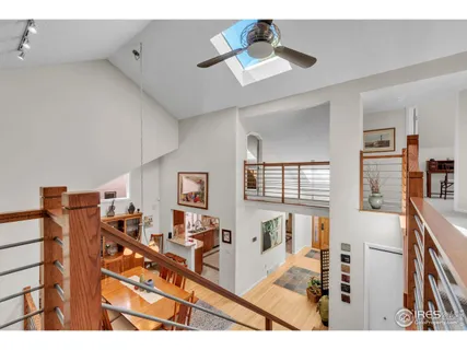 a view of deck with chairs a barbeque with wooden floor