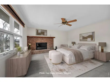 a bathroom with a sink mirror and a bath tub