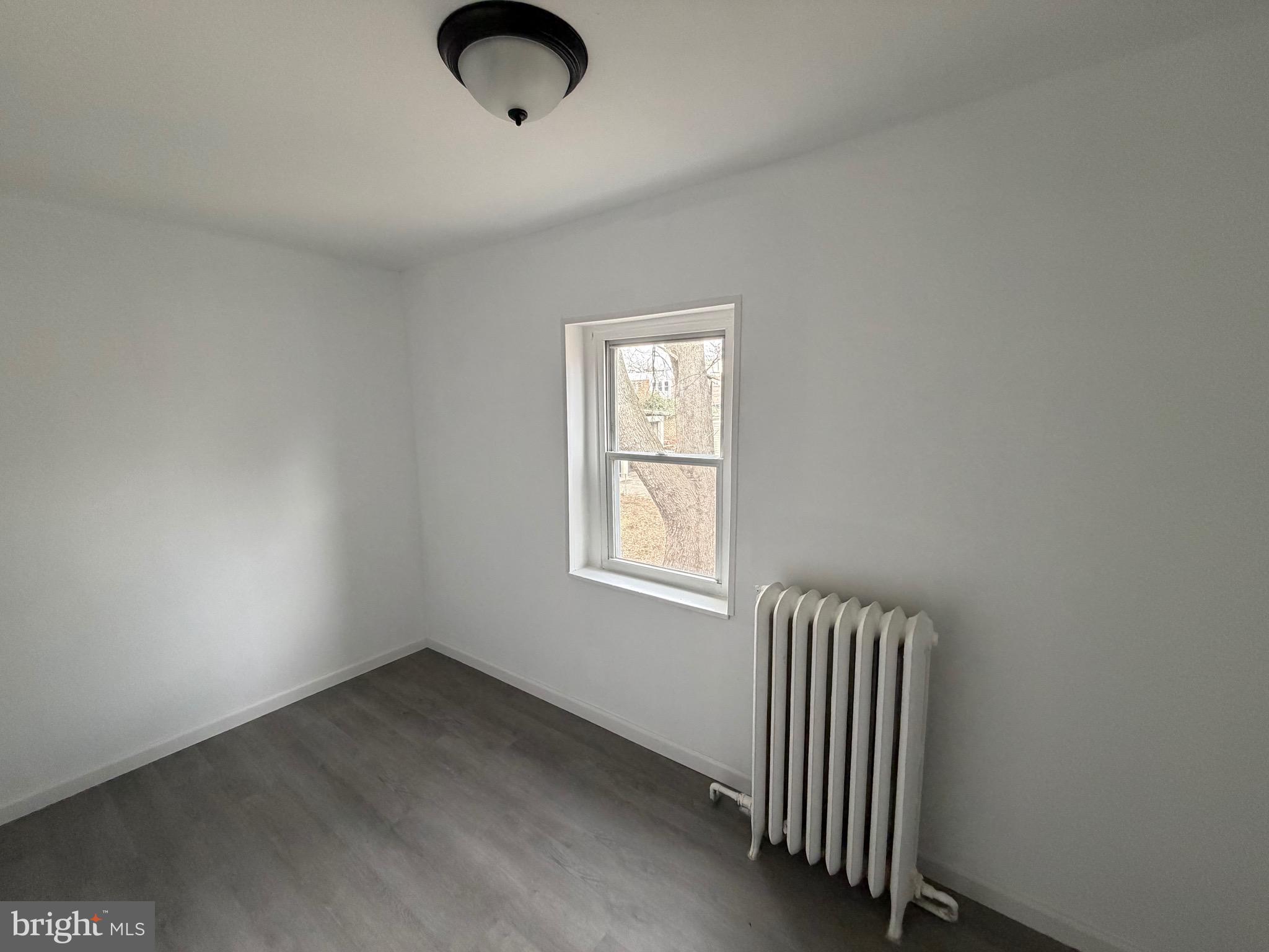 4148 Orchard Street Philadelphia, PA 19124 - Photo 14 of 25 an empty room with a window