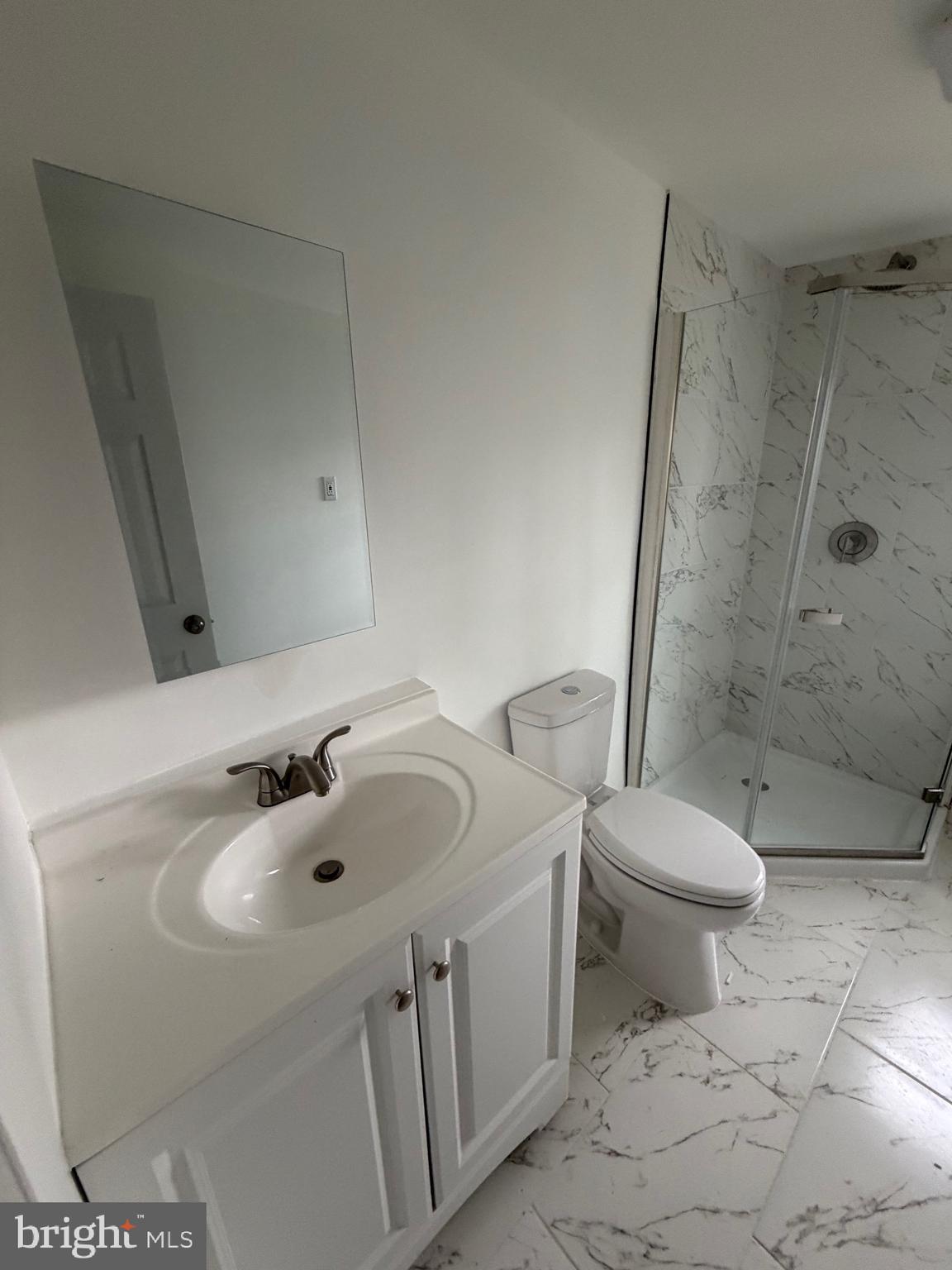 4148 Orchard Street Philadelphia, PA 19124 - Photo 17 of 25 a bathroom with a sink and a toilet