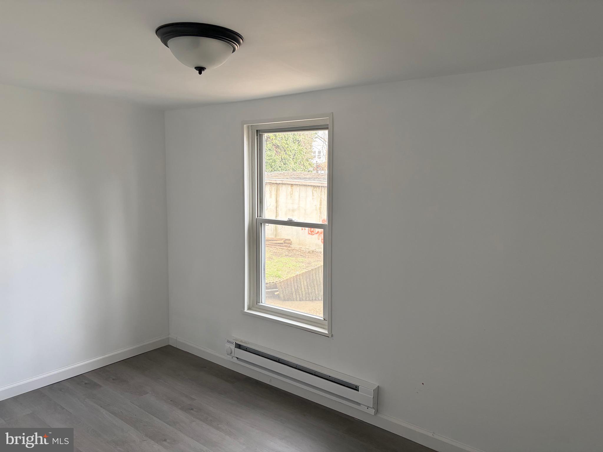4148 Orchard Street Philadelphia, PA 19124 - Photo 18 of 25 an empty room with a window