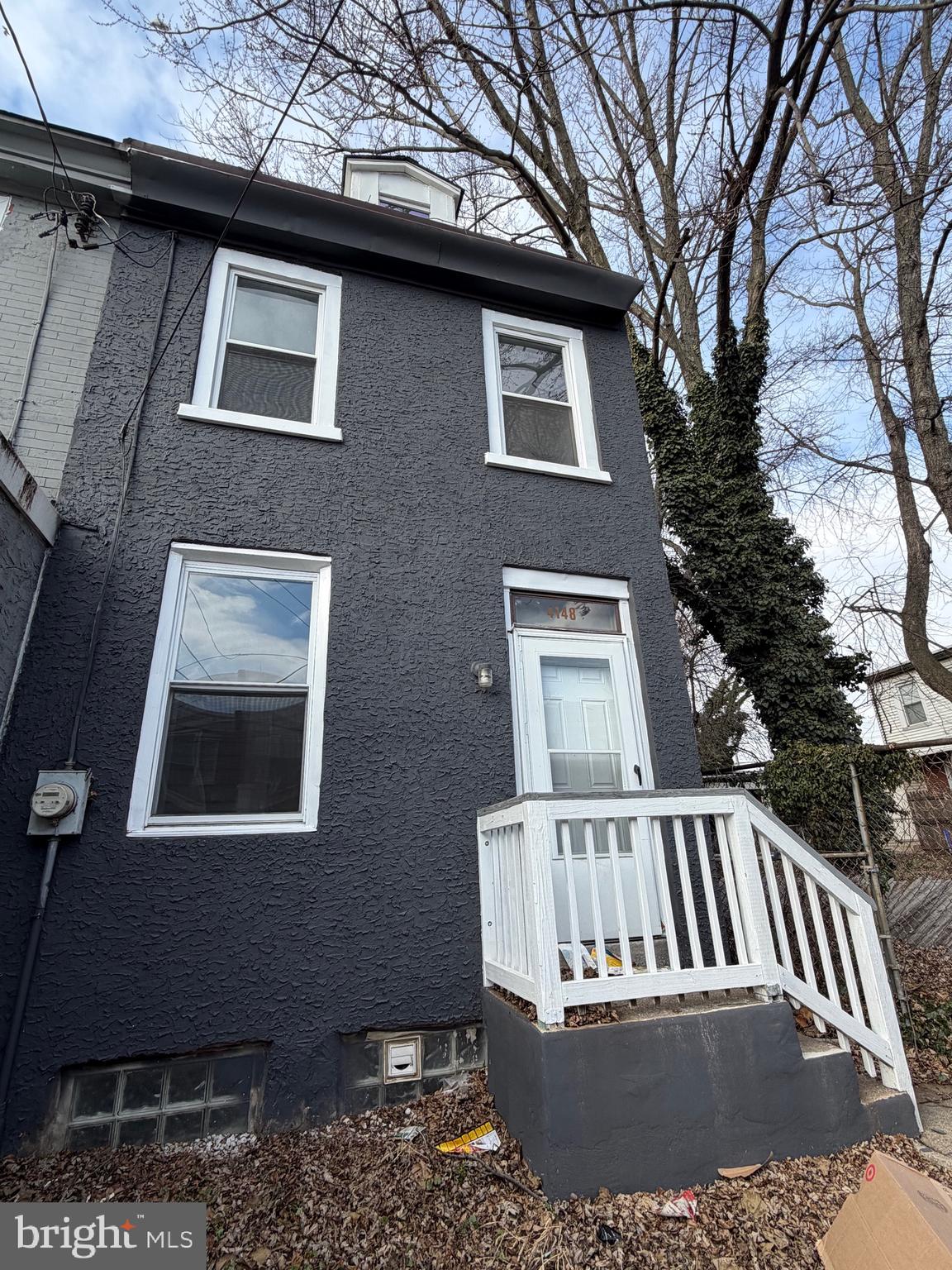 4148 Orchard Street Philadelphia, PA 19124 - Photo 2 of 25 a view of a brick house with a yard