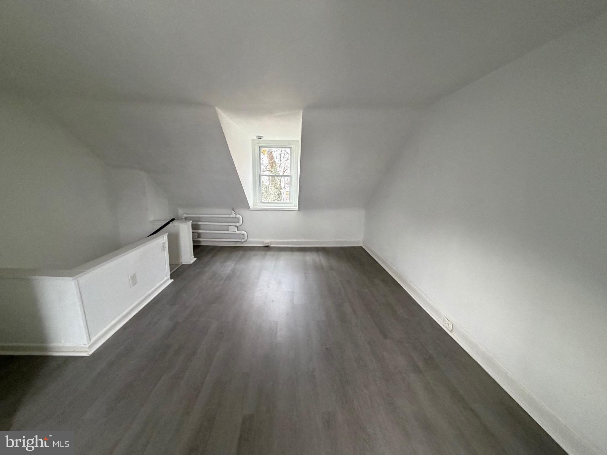 4148 Orchard Street Philadelphia, PA 19124 - Photo 23 of 25 wooden floor in an empty room with a window