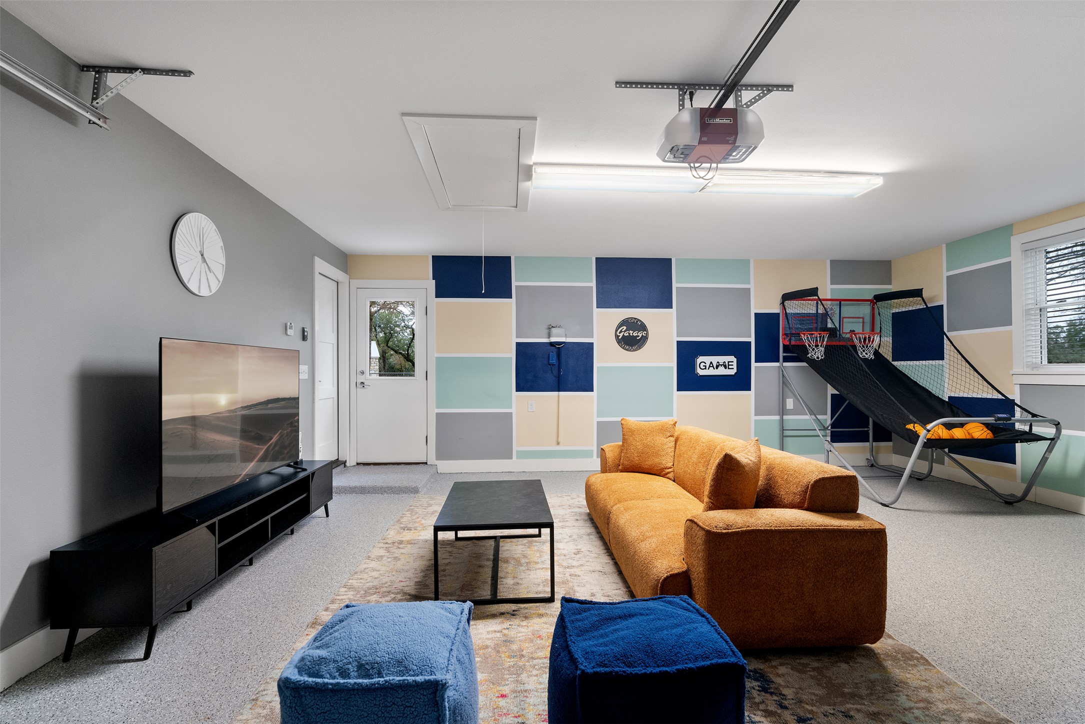 1100 Live Oak Road Leander, TX 78641 - Photo 20 of 40 Two car garage being used as Game room. Cooled with ductless mini-split system