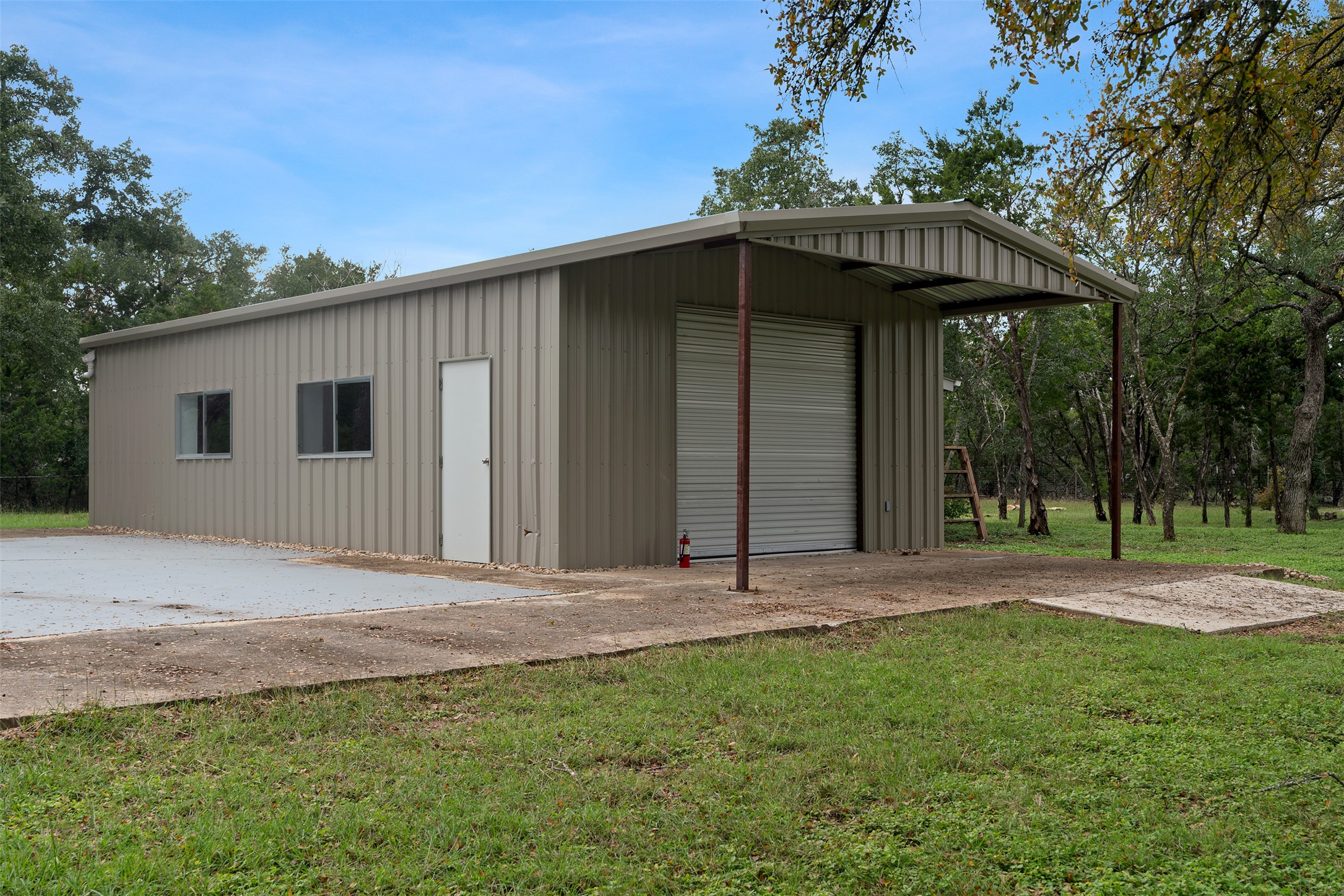 1100 Live Oak Road Leander, TX 78641 - Photo 6 of 40 Large workshop being used as events space. Cooled by ductless mini split system.