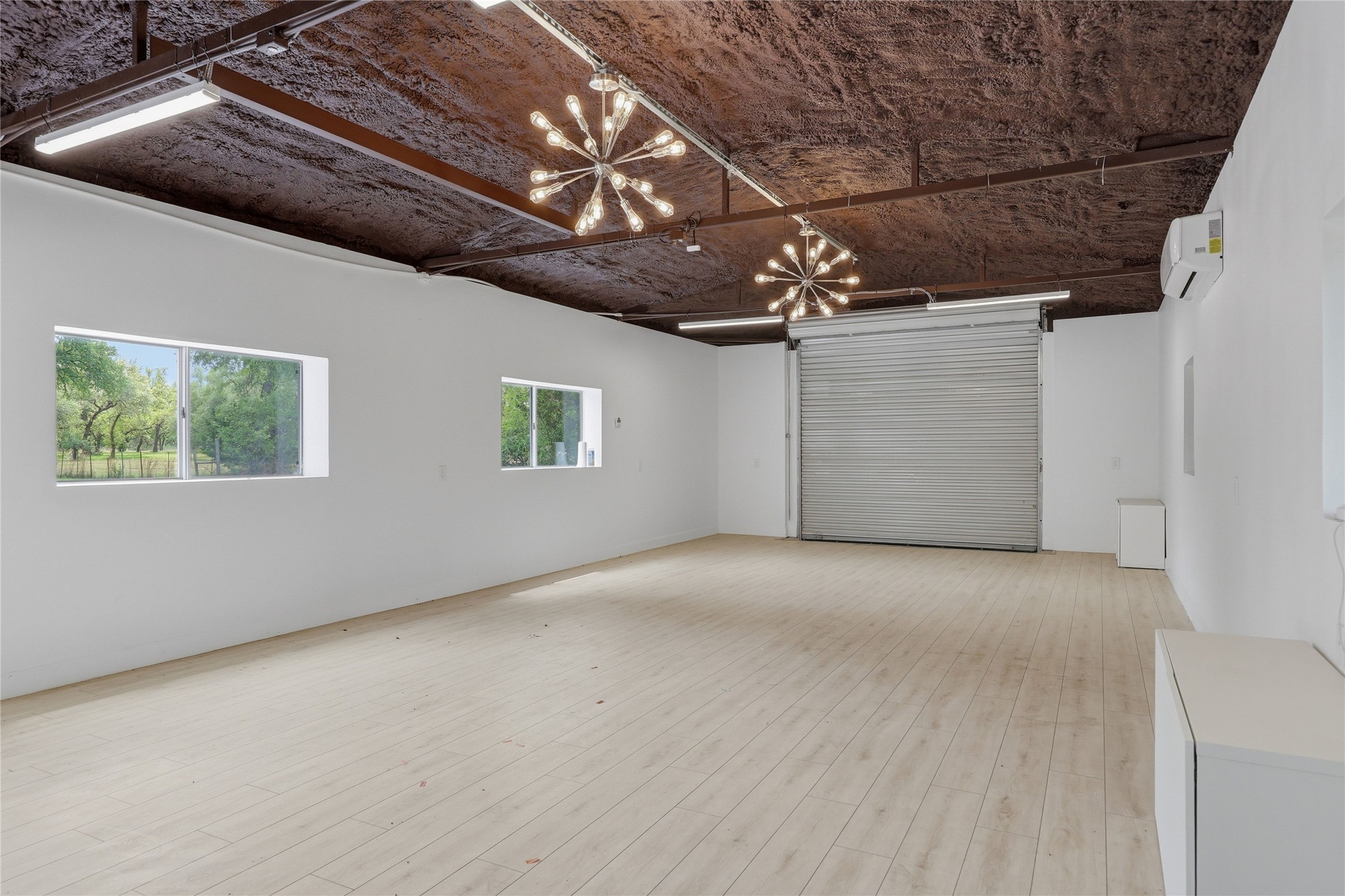 1100 Live Oak Road Leander, TX 78641 - Photo 7 of 40 Interior of the large workshop
