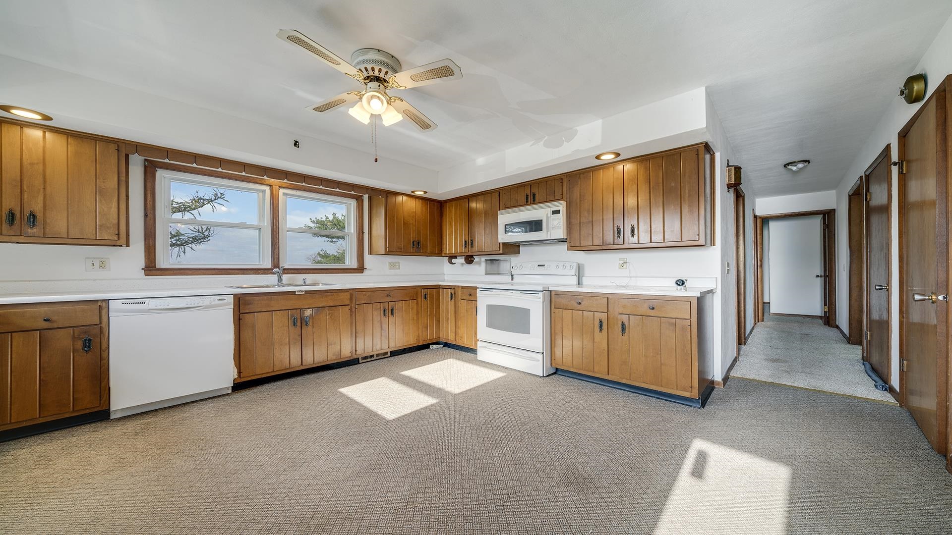 4303 Kendall Road Winnebago, IL 61088 - Photo 7 of 36 a large kitchen with a lot of counter space