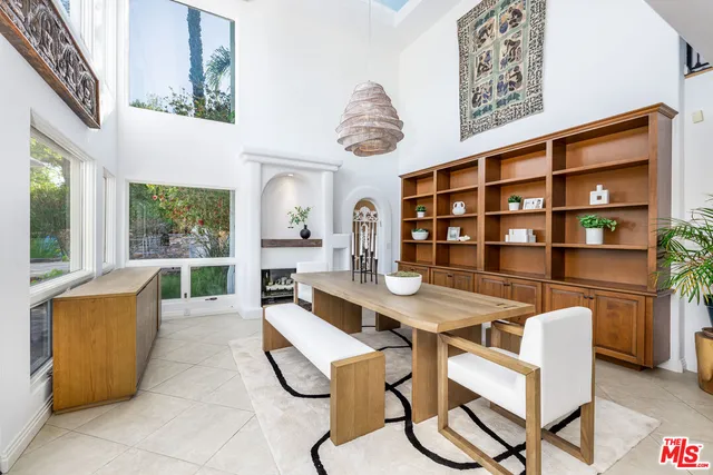 a bathroom with a double vanity sink and a bathtub