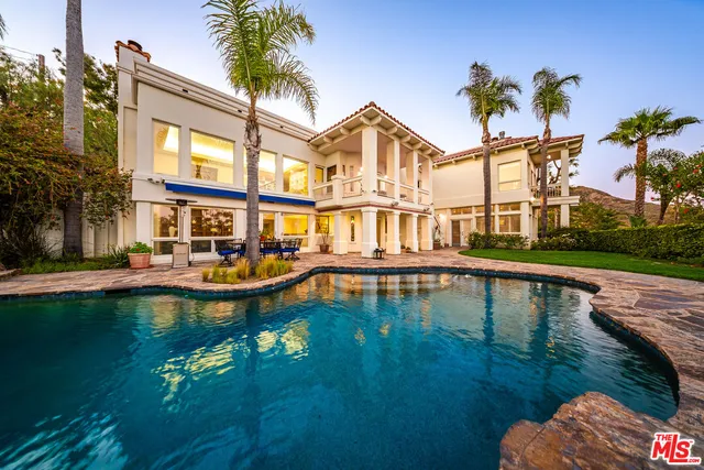 a picture of a book and a bed