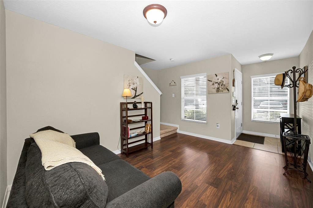 9736 Trumpet Vine Loop Trinity, FL 34655 - Photo 4 of 35 a bedroom with furniture and a window