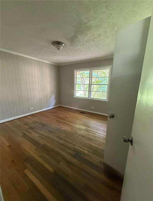 7205 Lakeview Drive Southwest Covington, GA 30014 - Photo 11 of 18 an empty room with windows