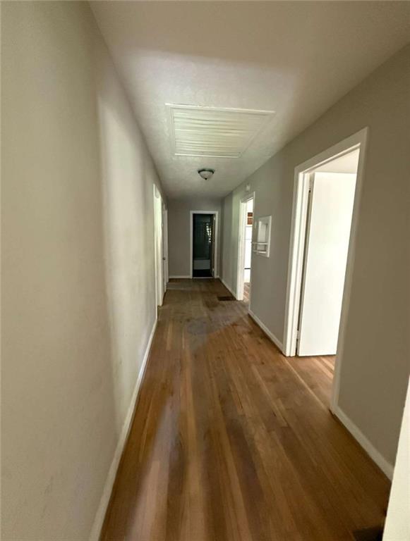 7205 Lakeview Drive Southwest Covington, GA 30014 - Photo 15 of 18 a view of a hallway with wooden floor