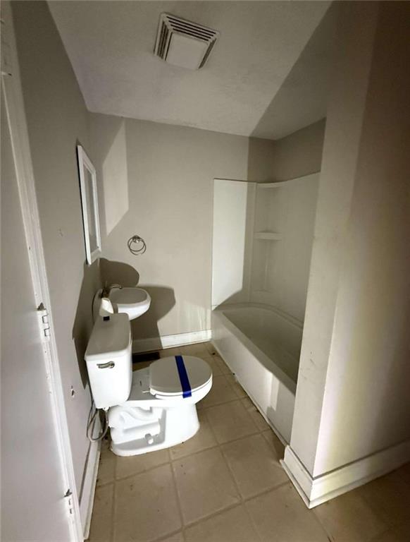 7205 Lakeview Drive Southwest Covington, GA 30014 - Photo 17 of 18 a bathroom with a sink and mirror