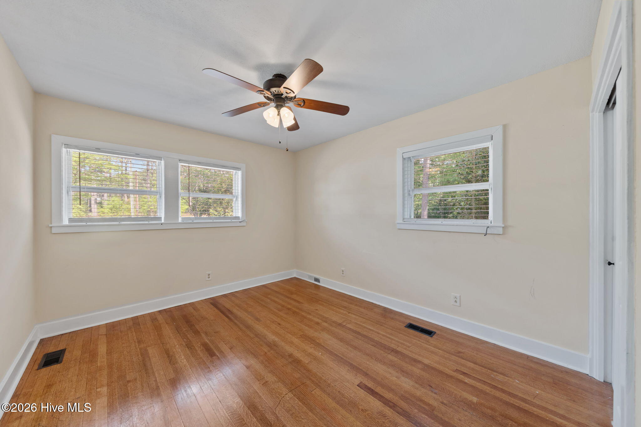 1010 Bion Butler Road Aberdeen, NC 28315 - Photo 34 of 62 Bedroom 3 includes a cedar closet and ample windows