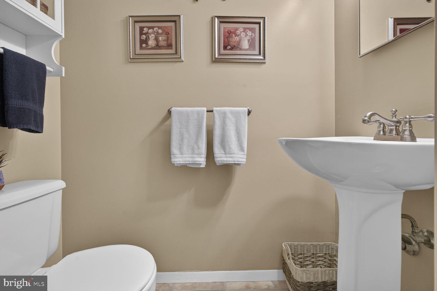 6130 Snowdens Run Road Eldersburg, MD 21784 - Photo 11 of 33 main level hall half bathroom