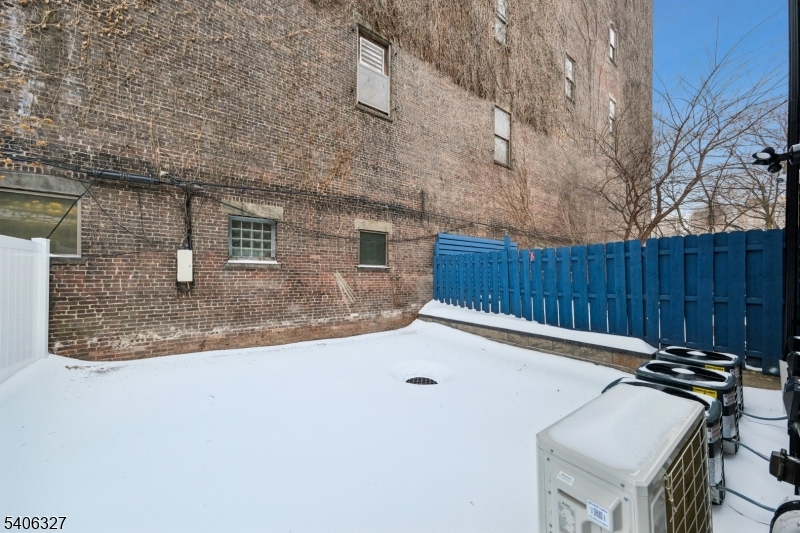 52 James Street, Unit 2 Newark, NJ 07102 - Photo 27 of 27 front view of a house with a small yard