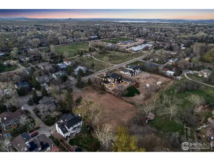 an aerial view of residential house and green space