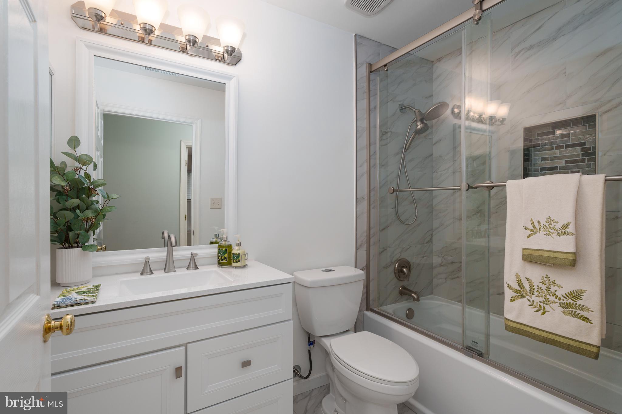 19 Rider Terrace Princeton, NJ 08540 - Photo 23 of 28 a bathroom with a sink a toilet and shower
