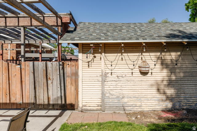 227 West 200 North Logan, UT 84321 - Photo 41 of 44 Detached structure with horizontal siding and a shingled roof