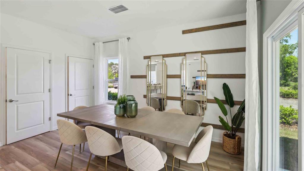 24430 Northwest 10th Road Newberry, FL 32669 - Photo 10 of 24 a dining room with furniture and a window