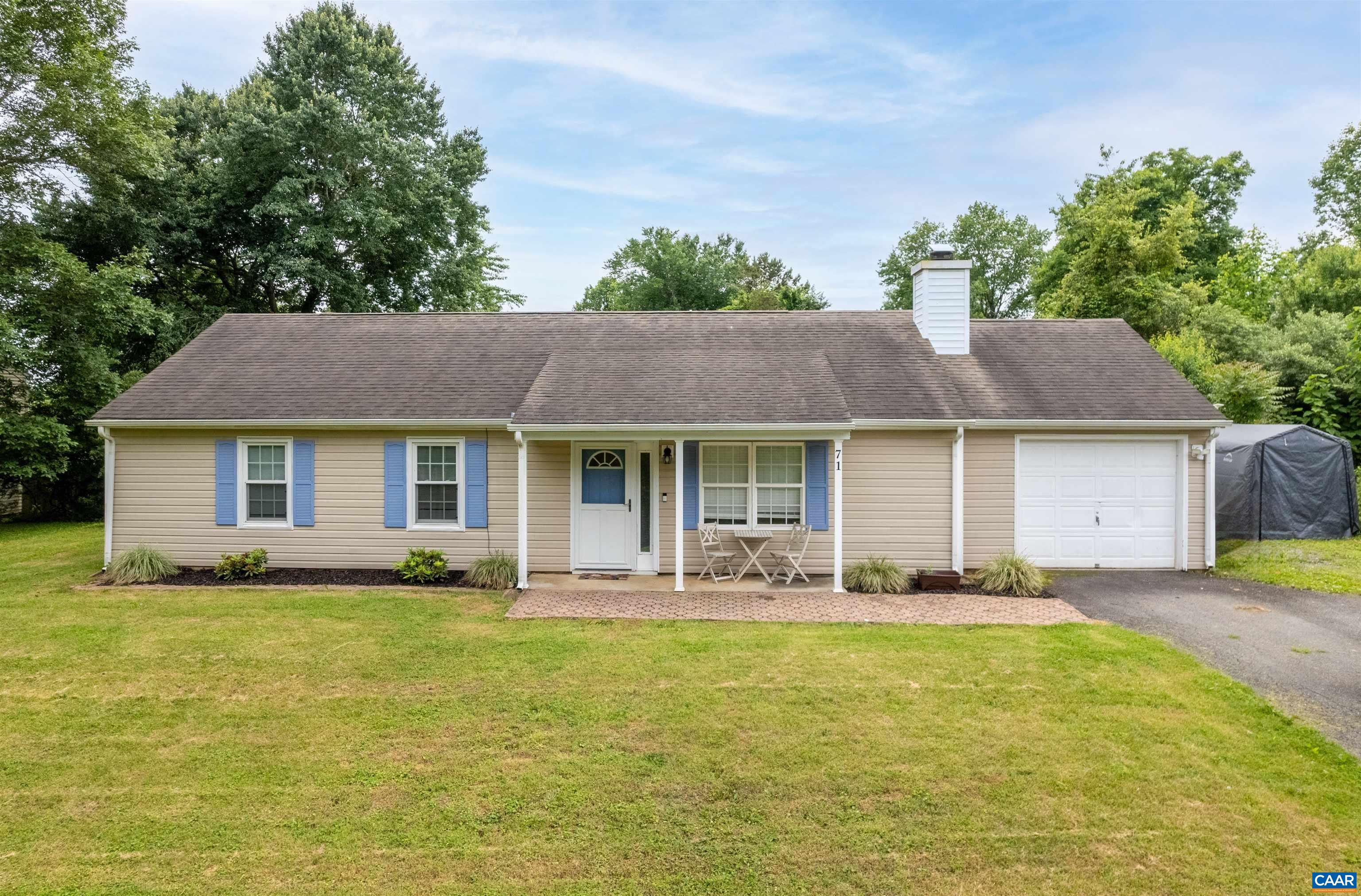 71 Blue Bell Road Ruckersville, VA 22968 - Photo 1 of 28 a front view of house with yard outdoor seating and barbeque oven