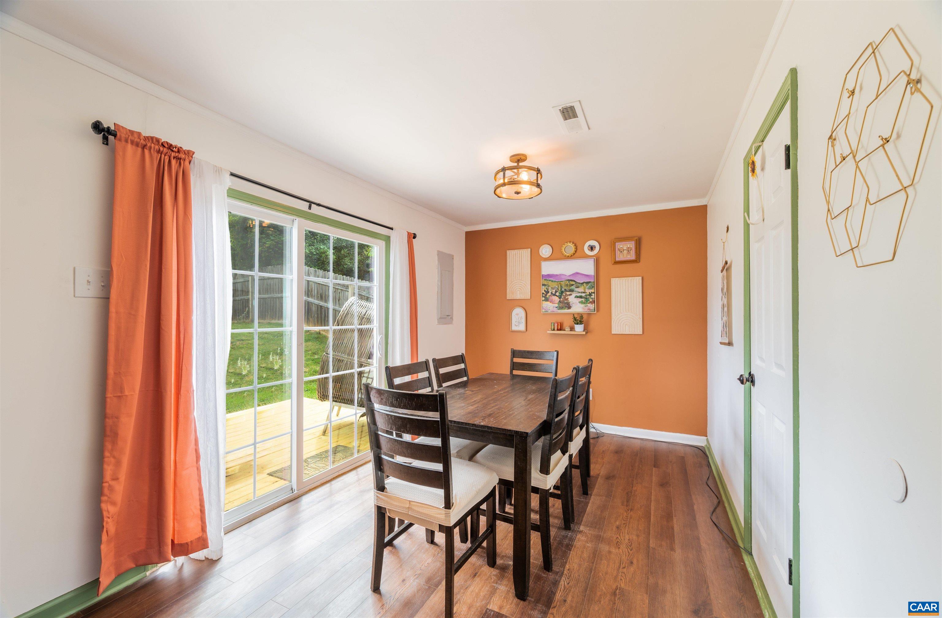 71 Blue Bell Road Ruckersville, VA 22968 - Photo 17 of 28 a view of a dining room with furniture and wooden floor