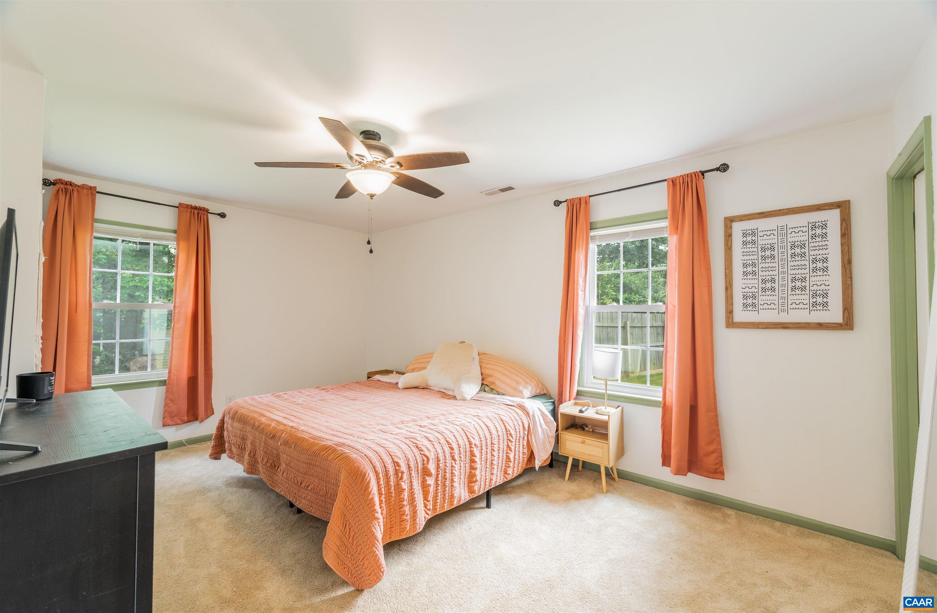 71 Blue Bell Road Ruckersville, VA 22968 - Photo 4 of 28 a bedroom with a bed and a large window