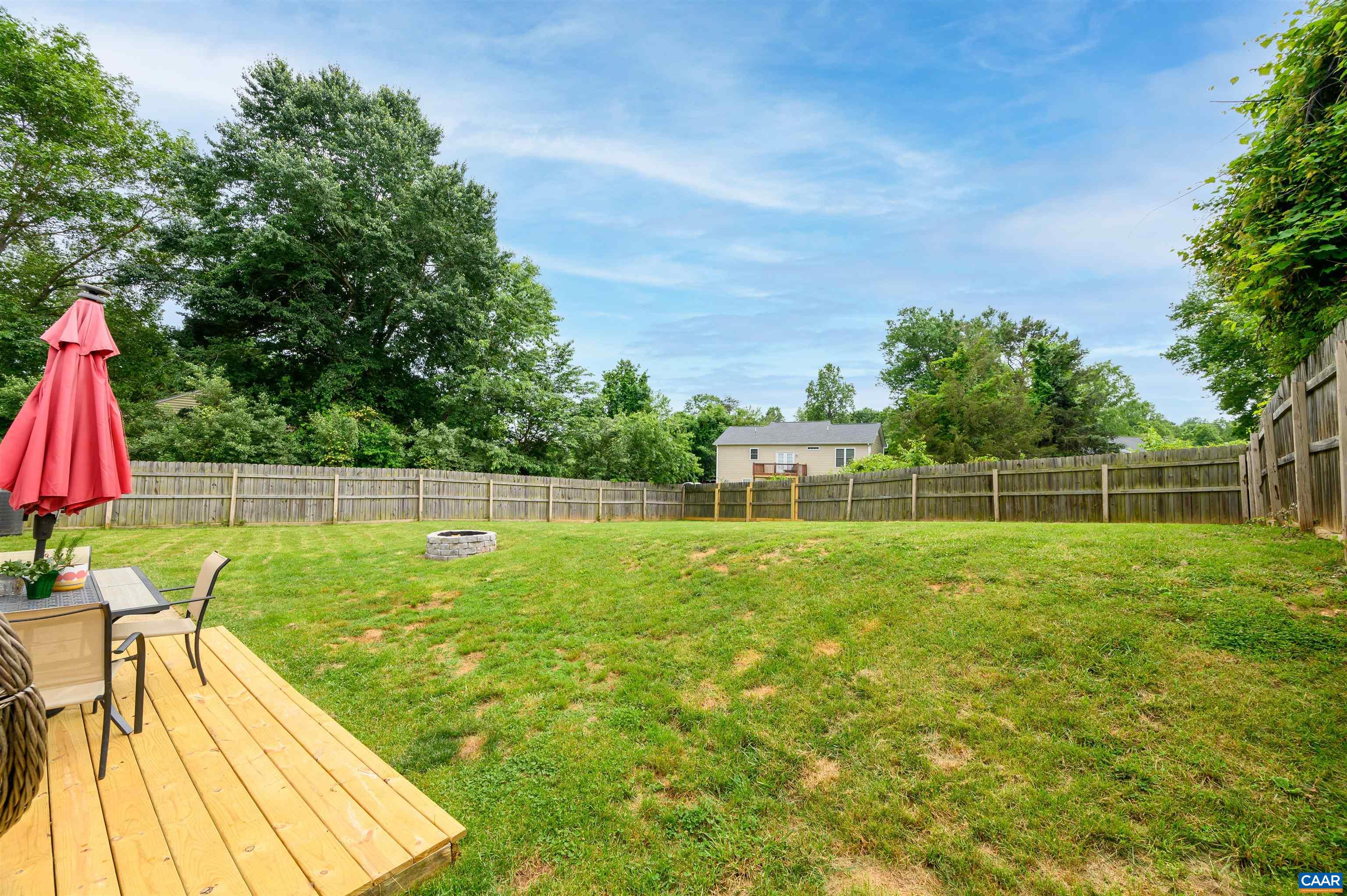 71 Blue Bell Road Ruckersville, VA 22968 - Photo 7 of 28 a view of a backyard with swimming pool