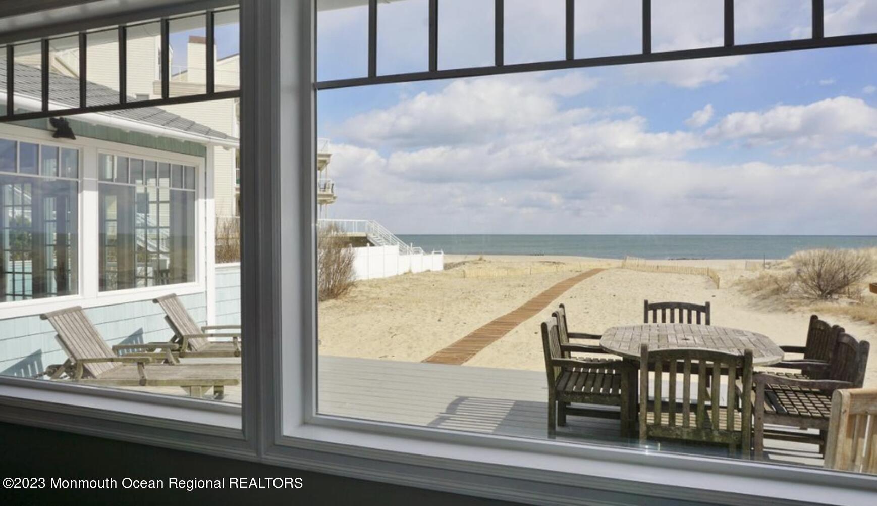 469 Ocean Avenue North, Unit WINTER Long Branch, NJ 07740 - Photo 11 of 47 a view of a balcony with furniture