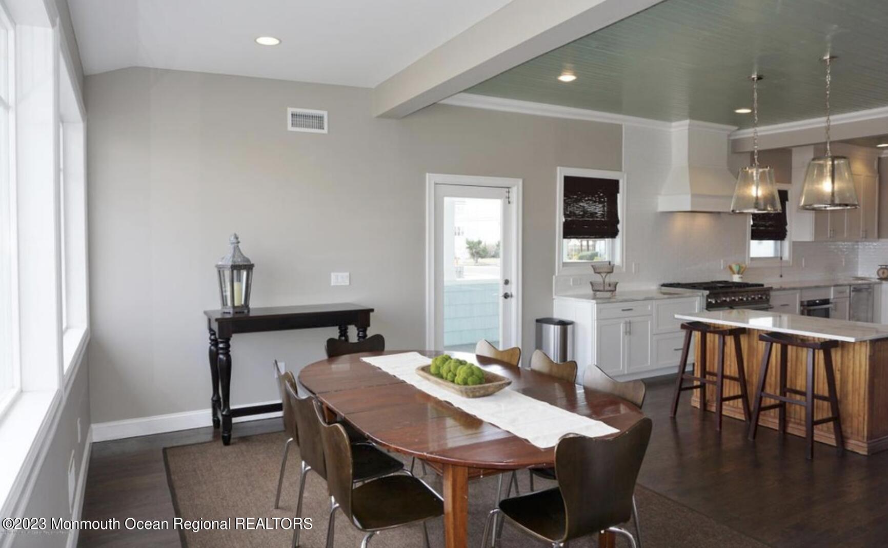 469 Ocean Avenue North, Unit WINTER Long Branch, NJ 07740 - Photo 12 of 47 a view of a dining room with furniture