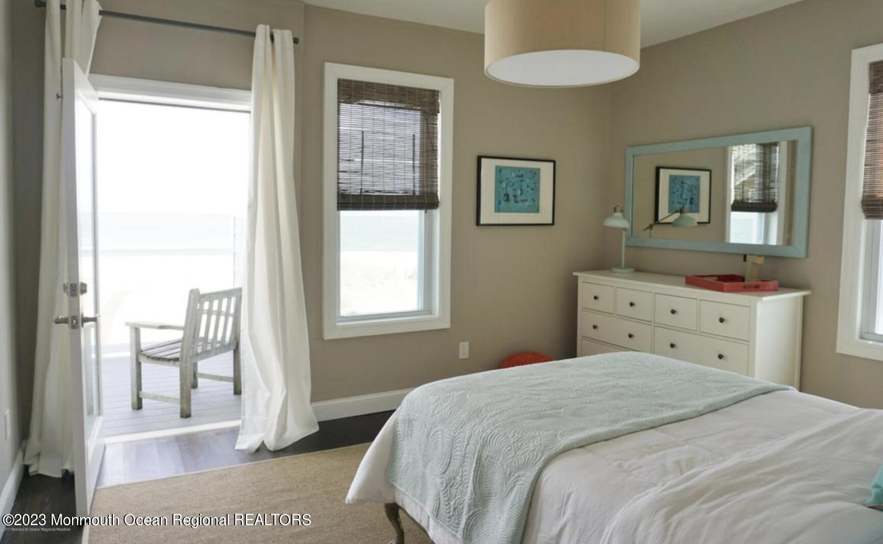 469 Ocean Avenue North, Unit WINTER Long Branch, NJ 07740 - Photo 24 of 47 a bedroom with a bed and a window