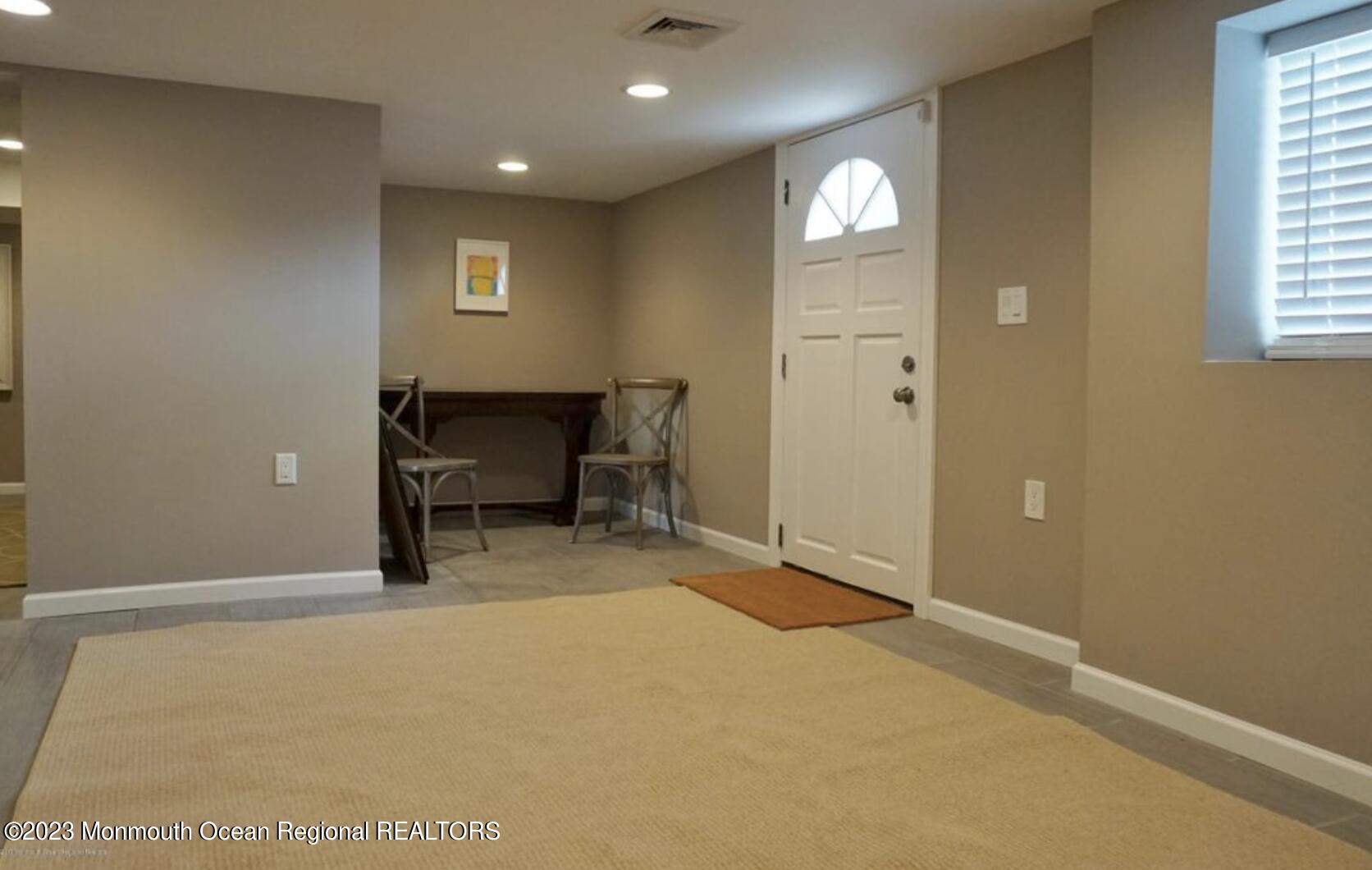 469 Ocean Avenue North, Unit WINTER Long Branch, NJ 07740 - Photo 38 of 47 a view of a livingroom with a window