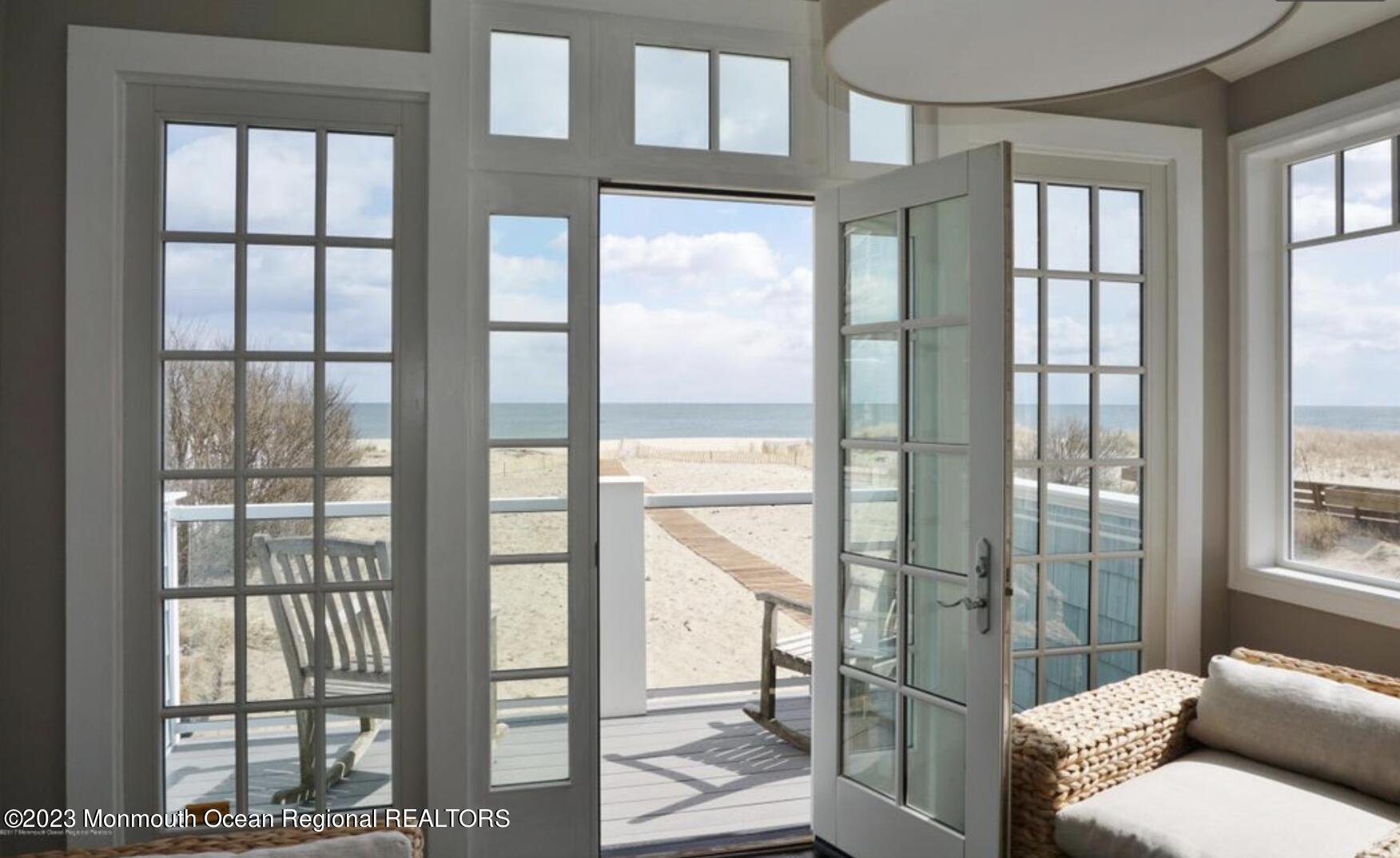 469 Ocean Avenue North, Unit WINTER Long Branch, NJ 07740 - Photo 4 of 47 a living room with a large window