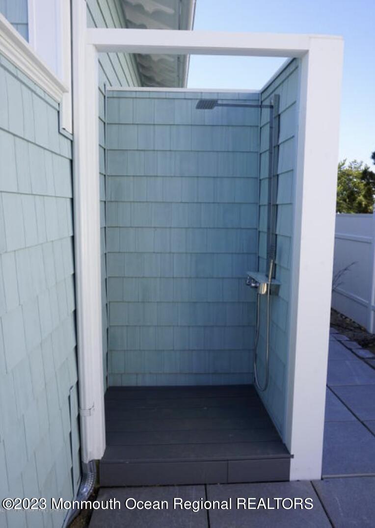 469 Ocean Avenue North, Unit WINTER Long Branch, NJ 07740 - Photo 44 of 47 a bathroom with a shower