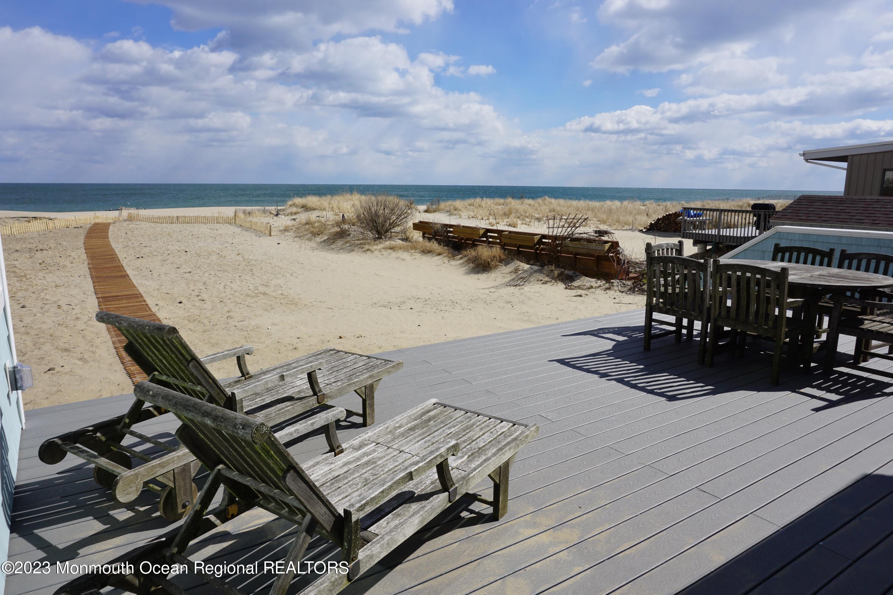 469 Ocean Avenue North, Unit WINTER Long Branch, NJ 07740 - Photo 46 of 47 a view of a terrace with chairs