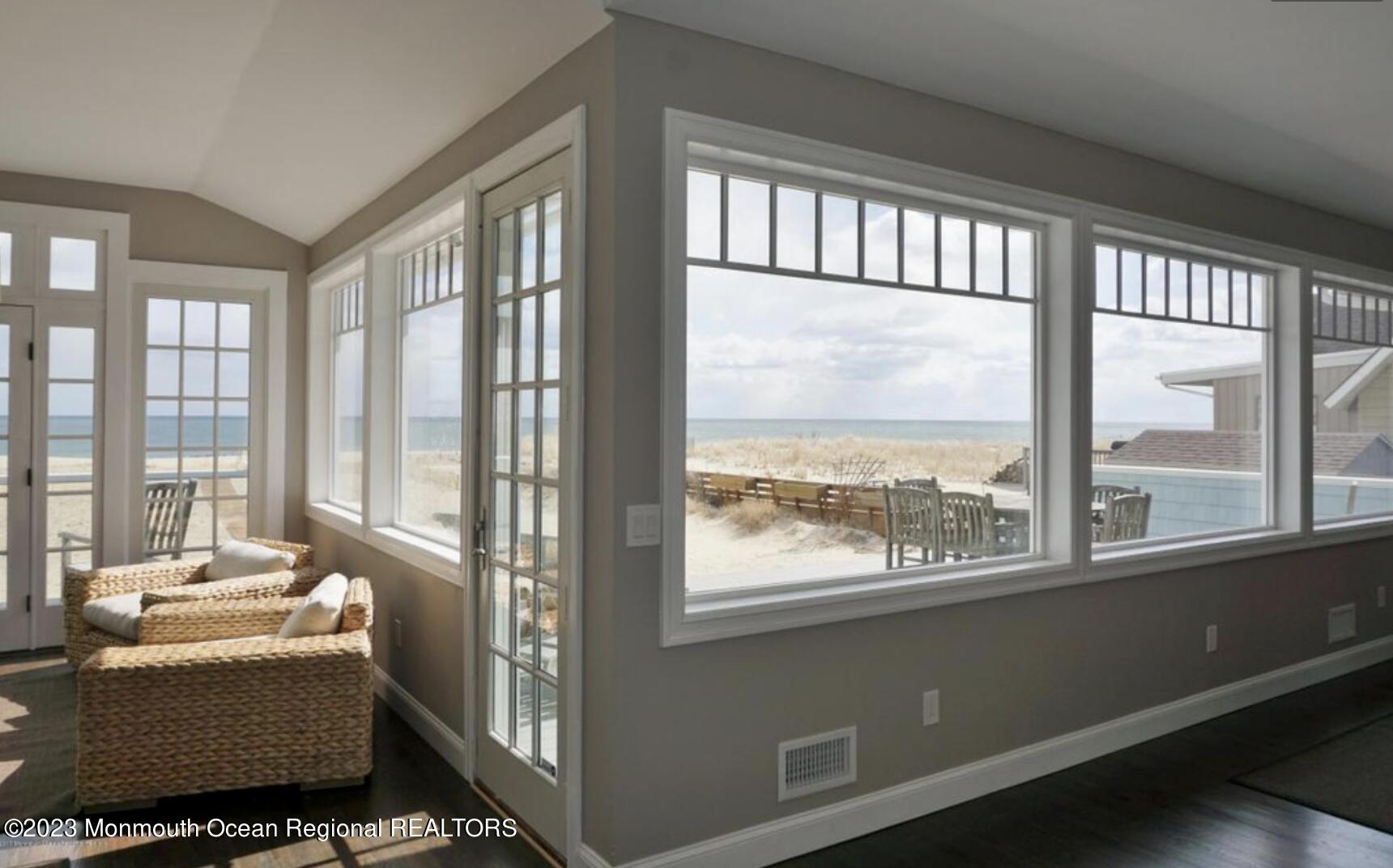 469 Ocean Avenue North, Unit WINTER Long Branch, NJ 07740 - Photo 6 of 47 a living room with couch and a window
