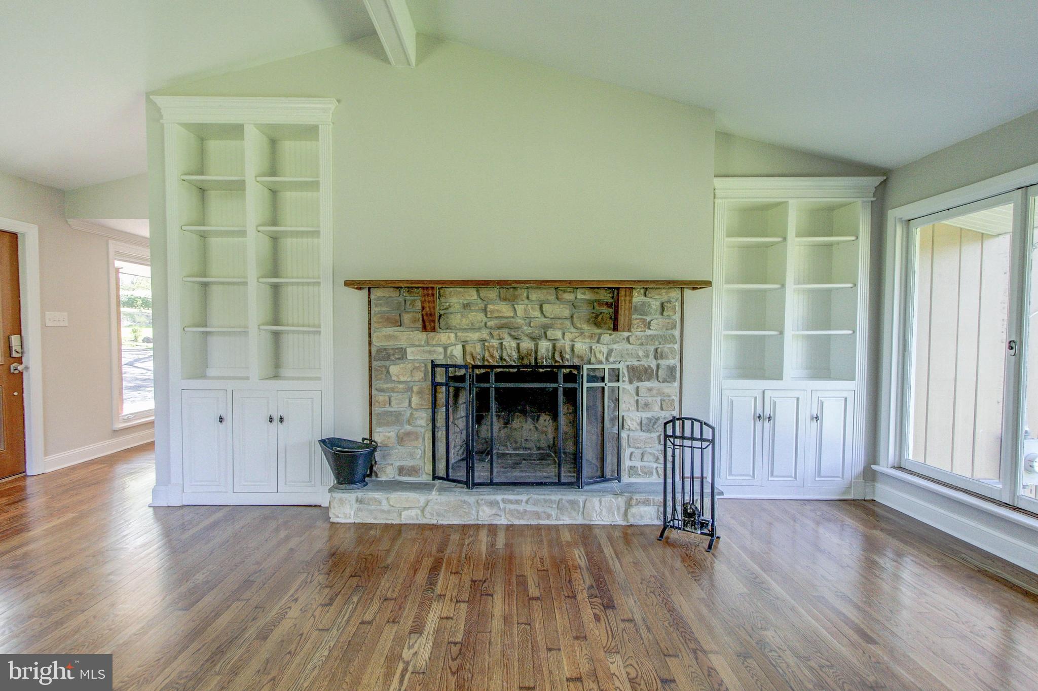 3115 Lower Mountain Road Furlong, PA 18925 - Photo 8 of 47 Fireplace accented by Built in shelves and storage