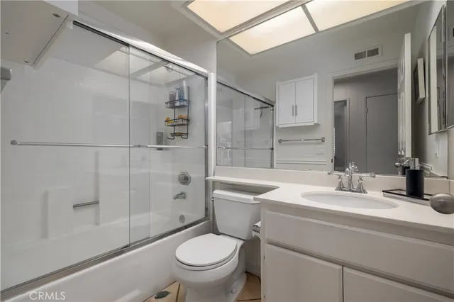 a view of storage and utility room with washer and dryer