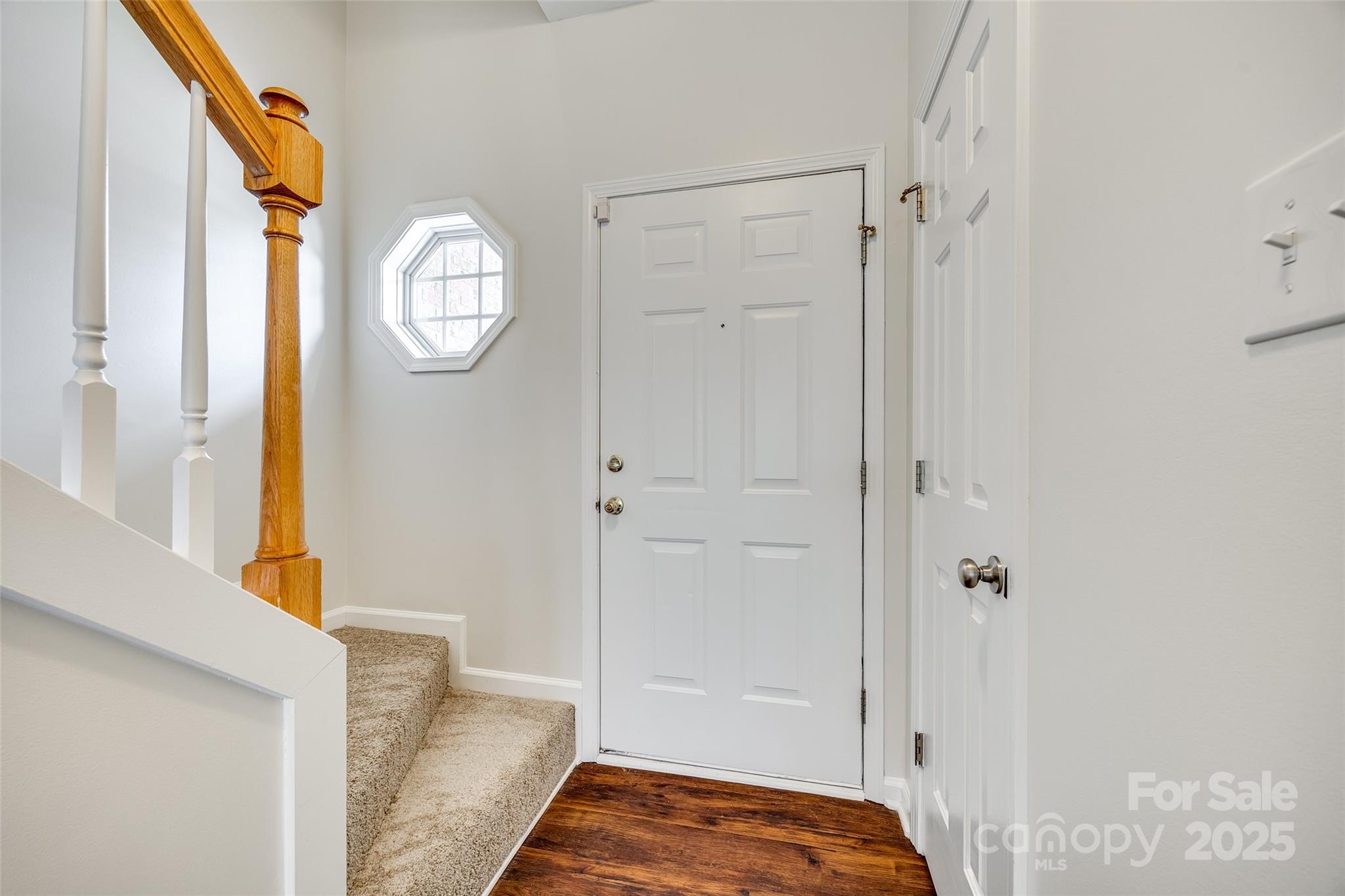 2035 Lennox Square Road Charlotte, NC 28210 - Photo 3 of 29 a view of bedroom with wooden floor and bathroom