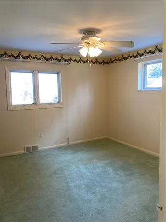 en empty room with a window