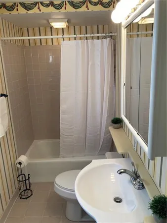 a bathroom with a sink and a tub