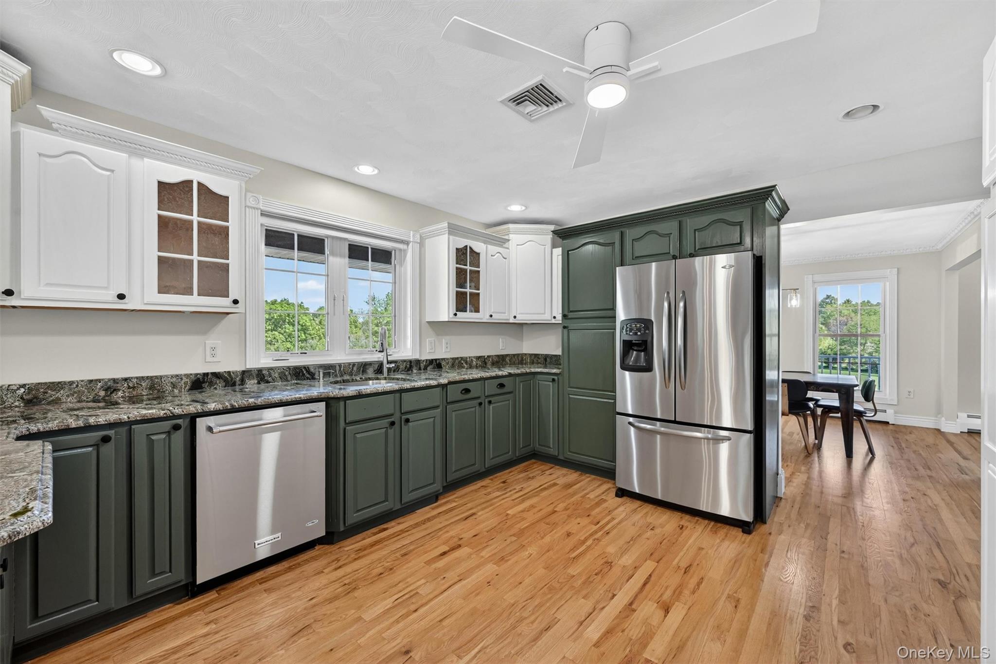 954 Ridgebury Road New Hampton, NY 10958 - Photo 19 of 45 With its freshly painted cabinetry, stainless steel appliances, and hardwood floors, the kitchen feels both polished and comfortable for daily use.