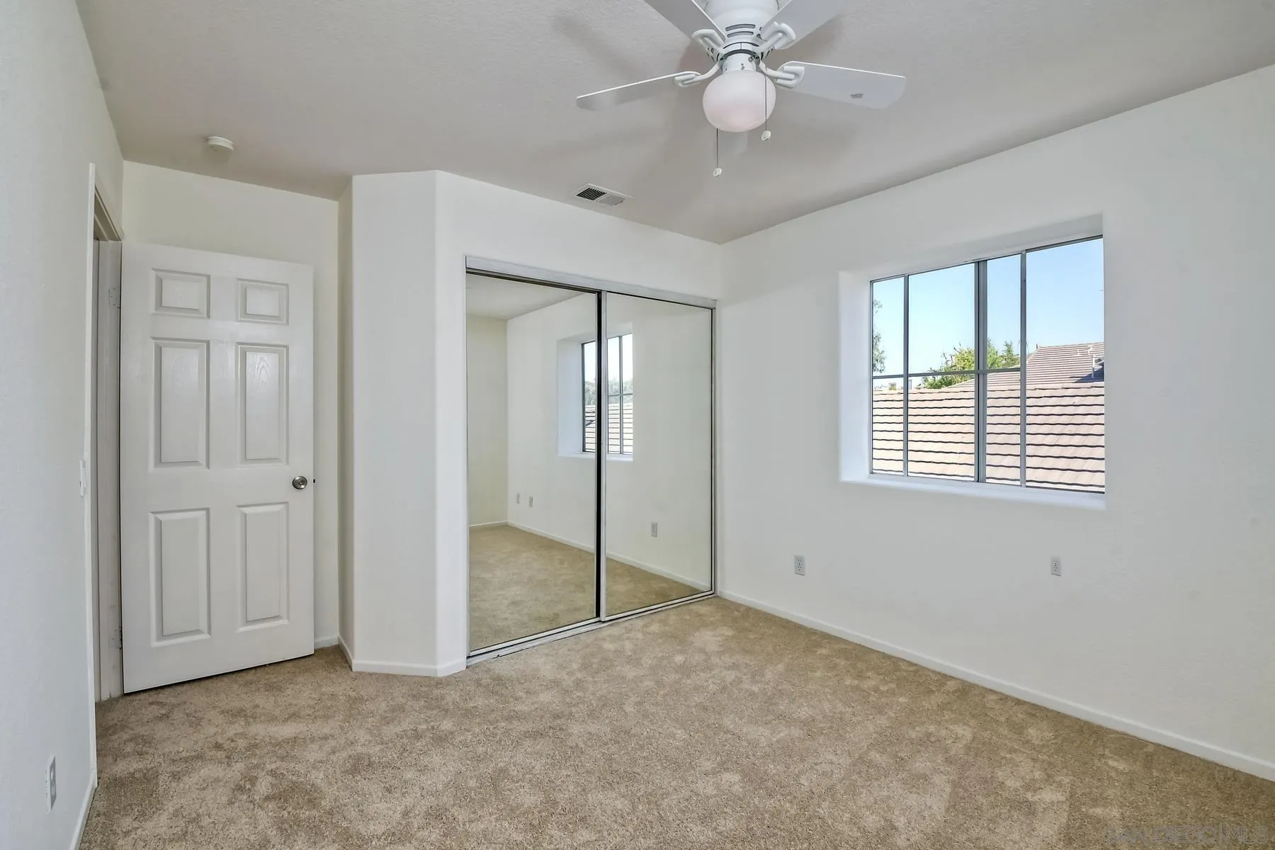13921 Midland Road Poway, CA 92064 - Photo 13 of 25 a view of an empty room with a window