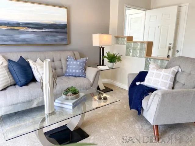 13921 Midland Road Poway, CA 92064 - Photo 3 of 25 a living room with furniture and a potted plant