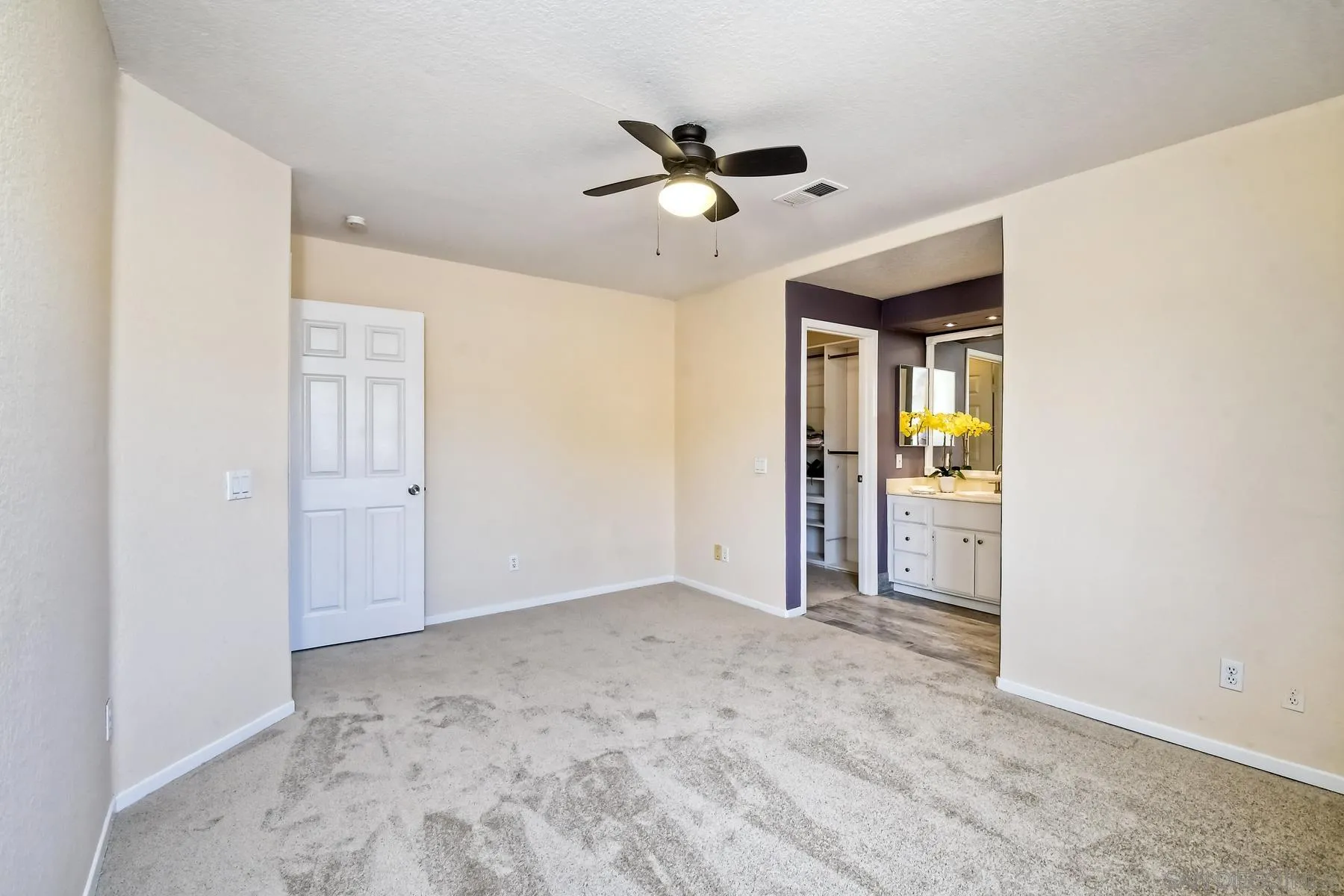 13921 Midland Road Poway, CA 92064 - Photo 8 of 25 a view of empty room with wooden floor and ceiling fan