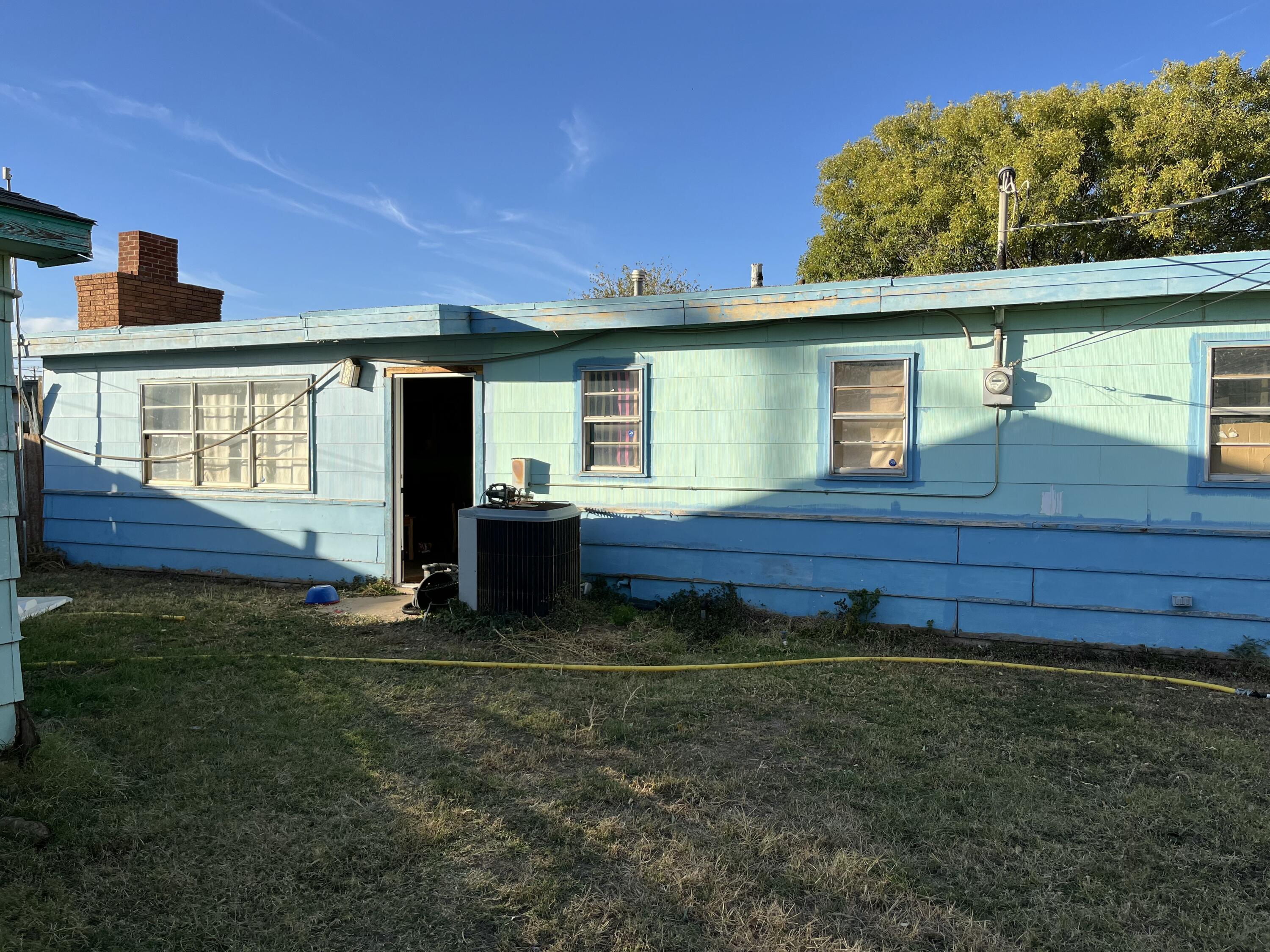 1107 53rd Street Lubbock, TX 79412 - Photo 2 of 2 a view of backyard with wooden fence